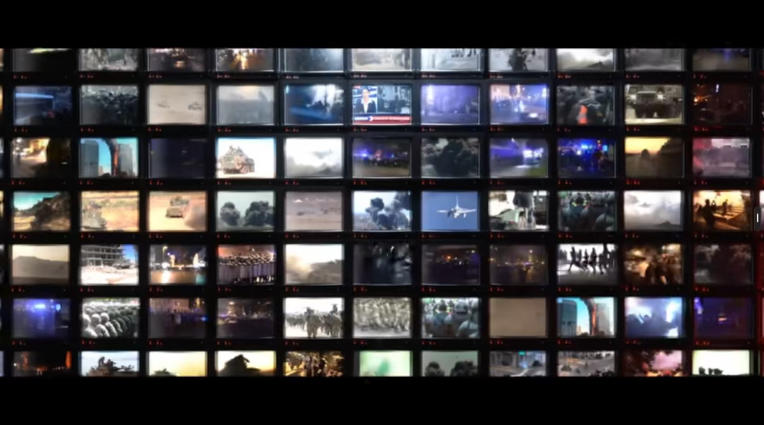 The promotional video depicts the global upheaval following the end of the Cold War